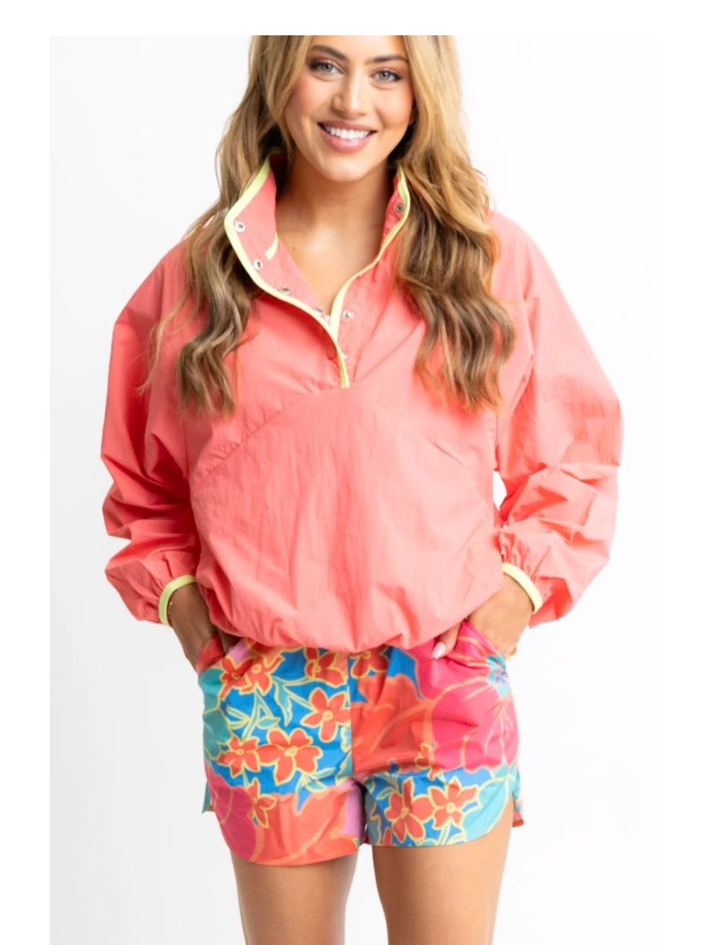 coral pullover top by the contemporary clothing brand Karlie.